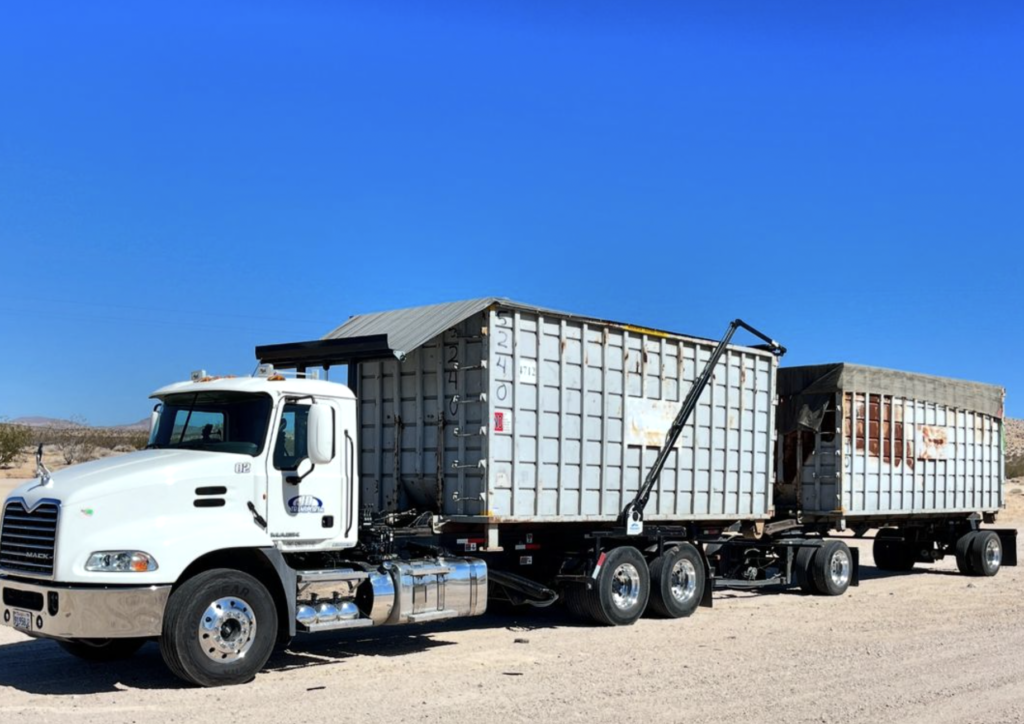 JD Transport dumpster truck